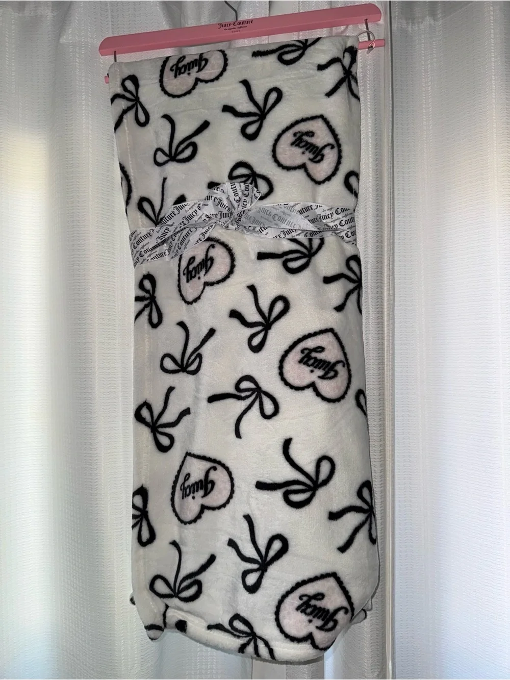 Juicy Couture White Fleece Throw with Black Heart & Bow Print light pink blanket